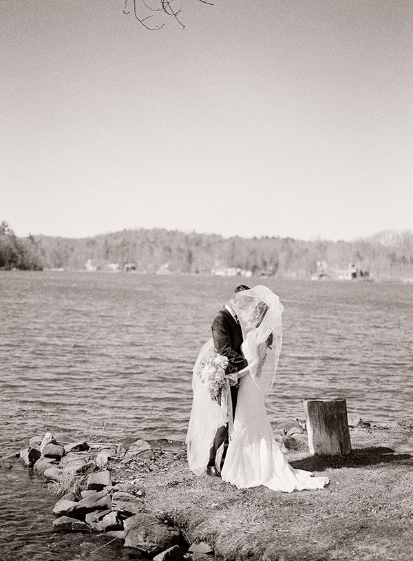 bride and groom on lake in new york | Heather Payne Photography